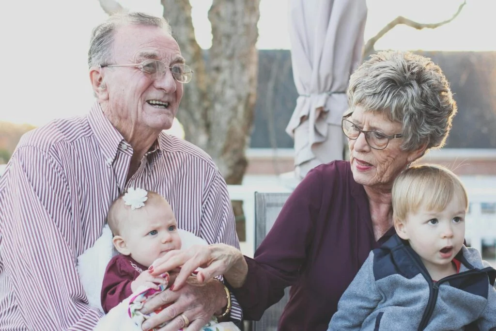 Grandparents with their grandchildren. 